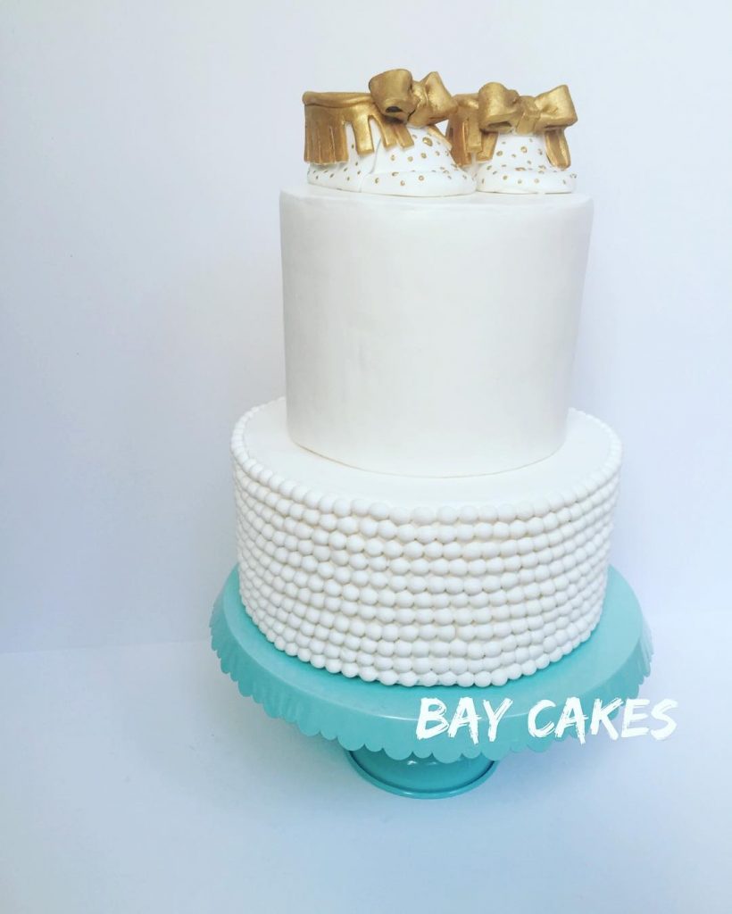 gold booties baby shower cake Bay cakes